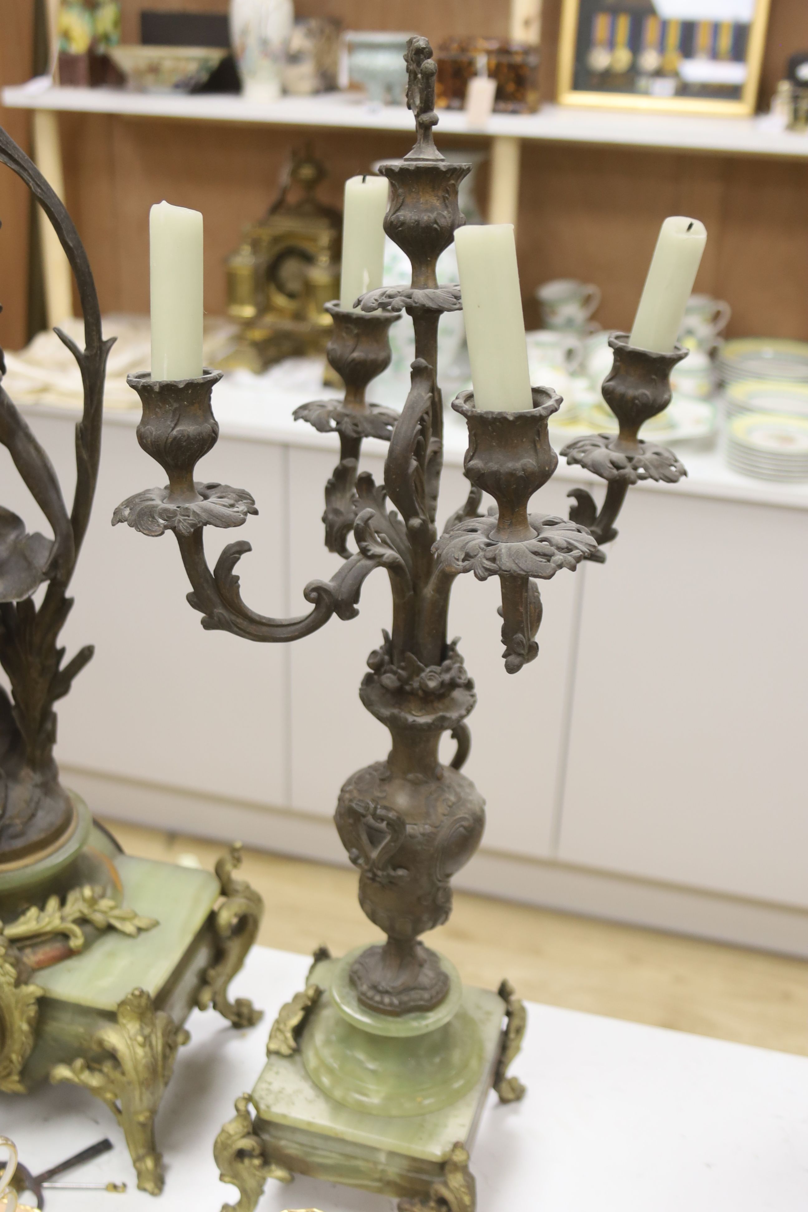 A 19th century French spelter and onyx clock garniture, height 61cm